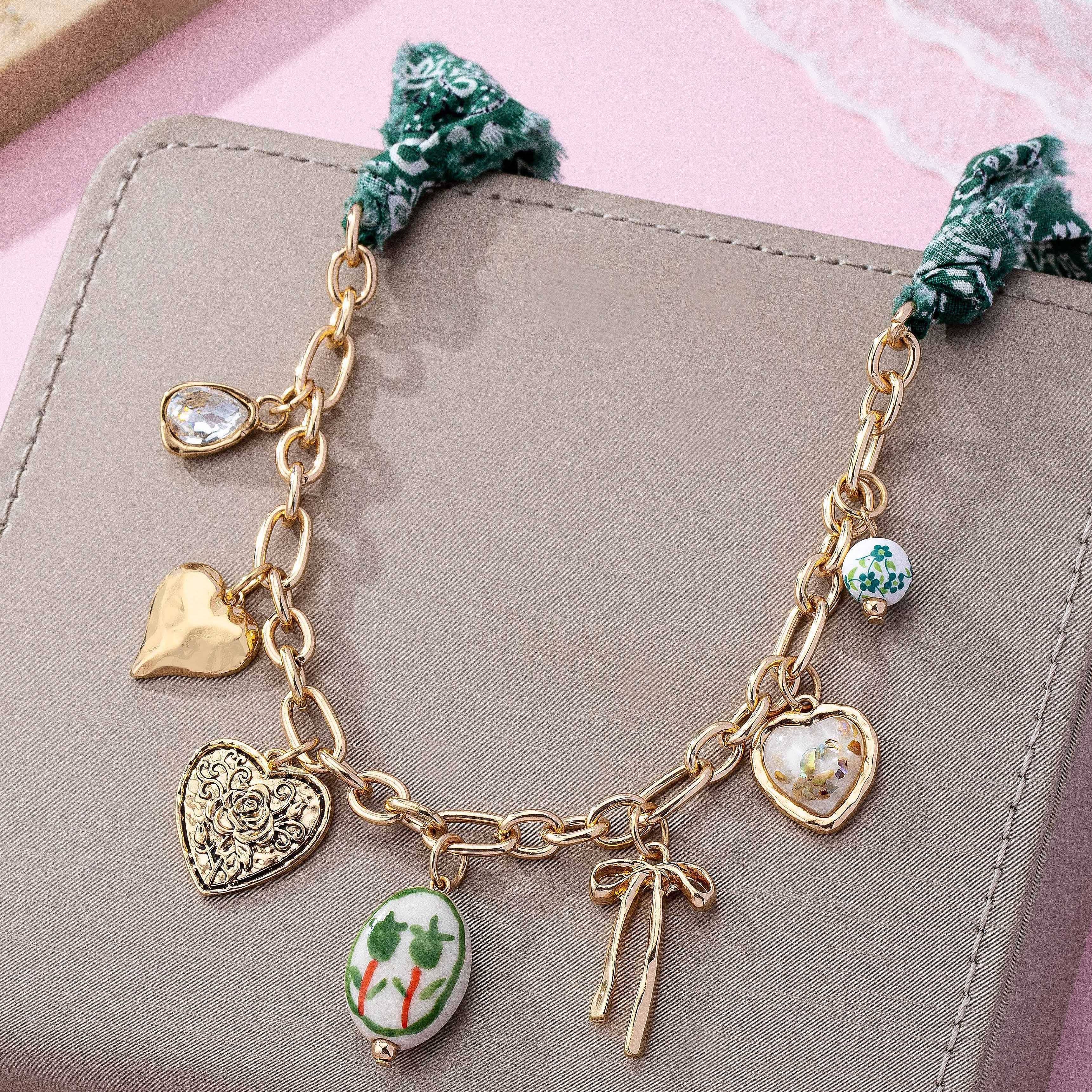 SCARF CHARM NECKLACE-PORCELAIN HEART BOW | 80N92717 - Proper