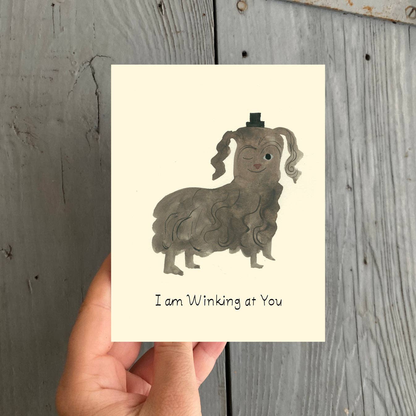 Winking At You Greeting Card - Proper